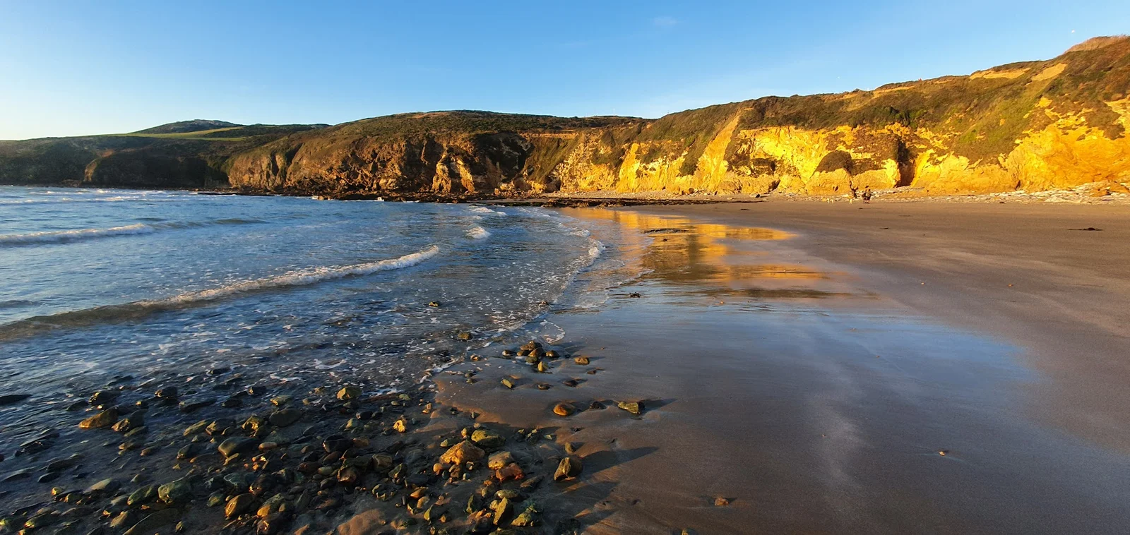 Church Bay Porth Swtan sheltered bay on the northwest coast of Anglesey at sunset