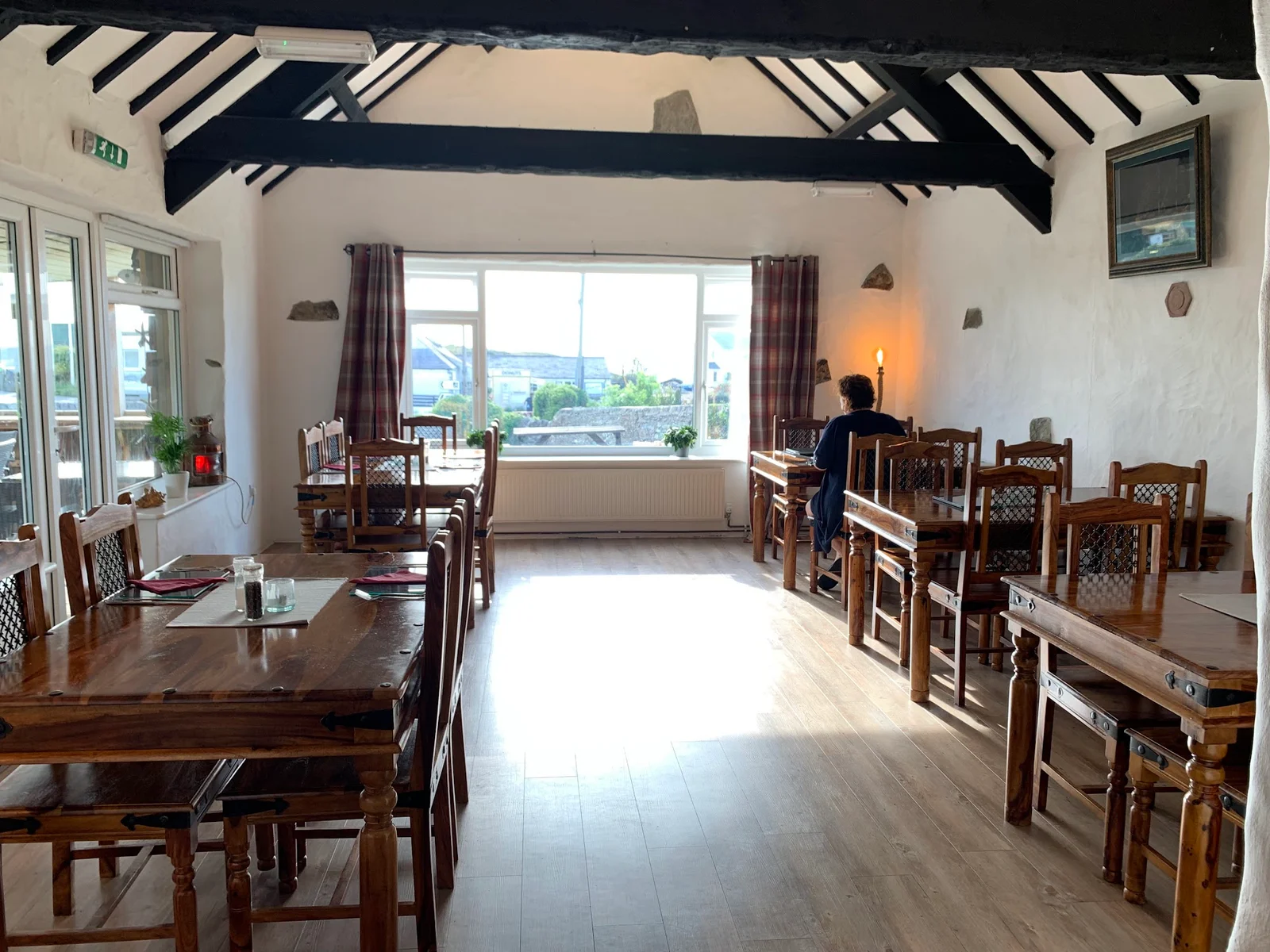 The Lobster Pot restaurant terrace above the slipway at Church Bay (Porth Swtan) on Anglesey's north coast