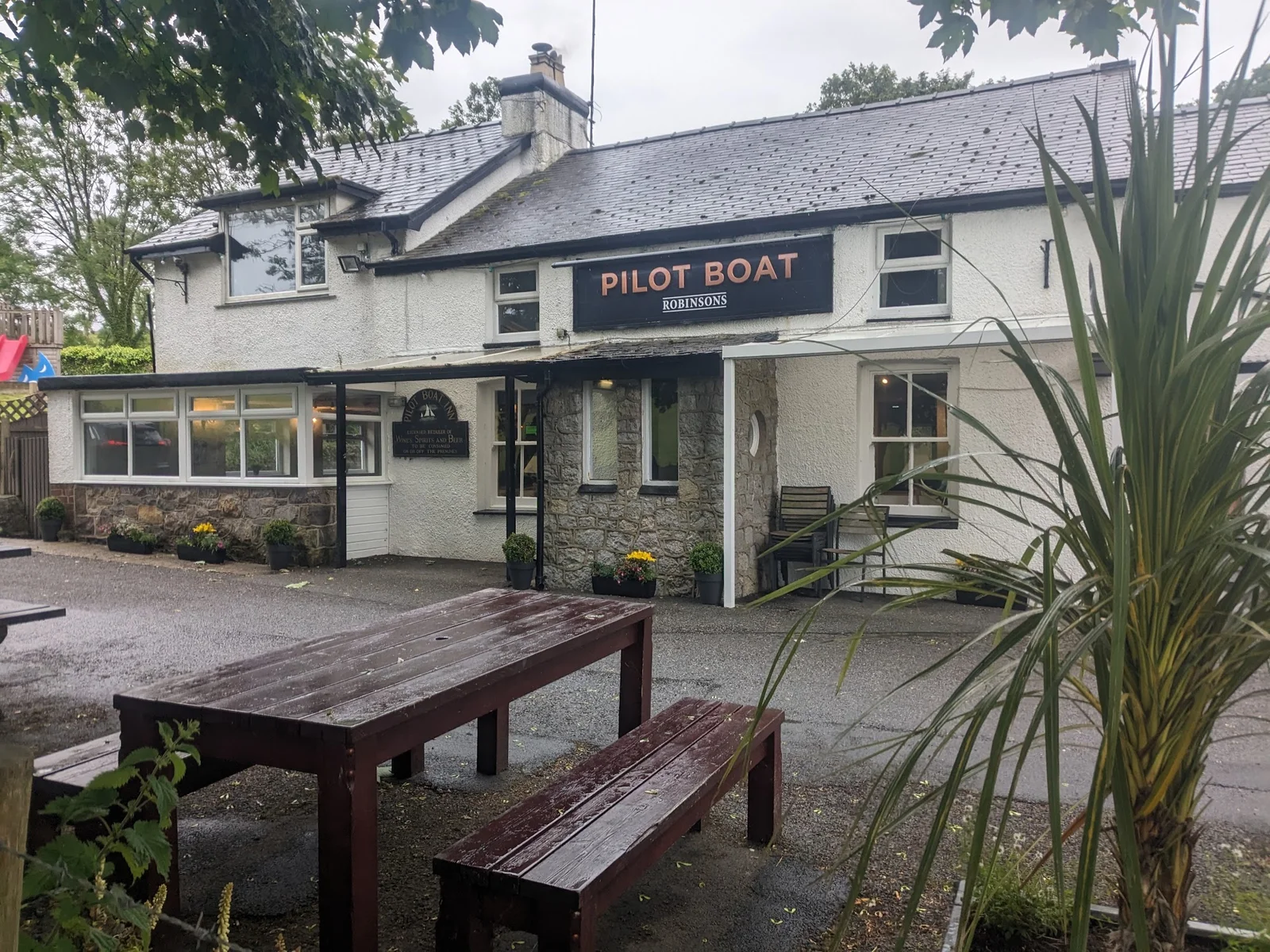The Pilot Boat pub on the Beaumaris seafront overlooking the Menai Strait