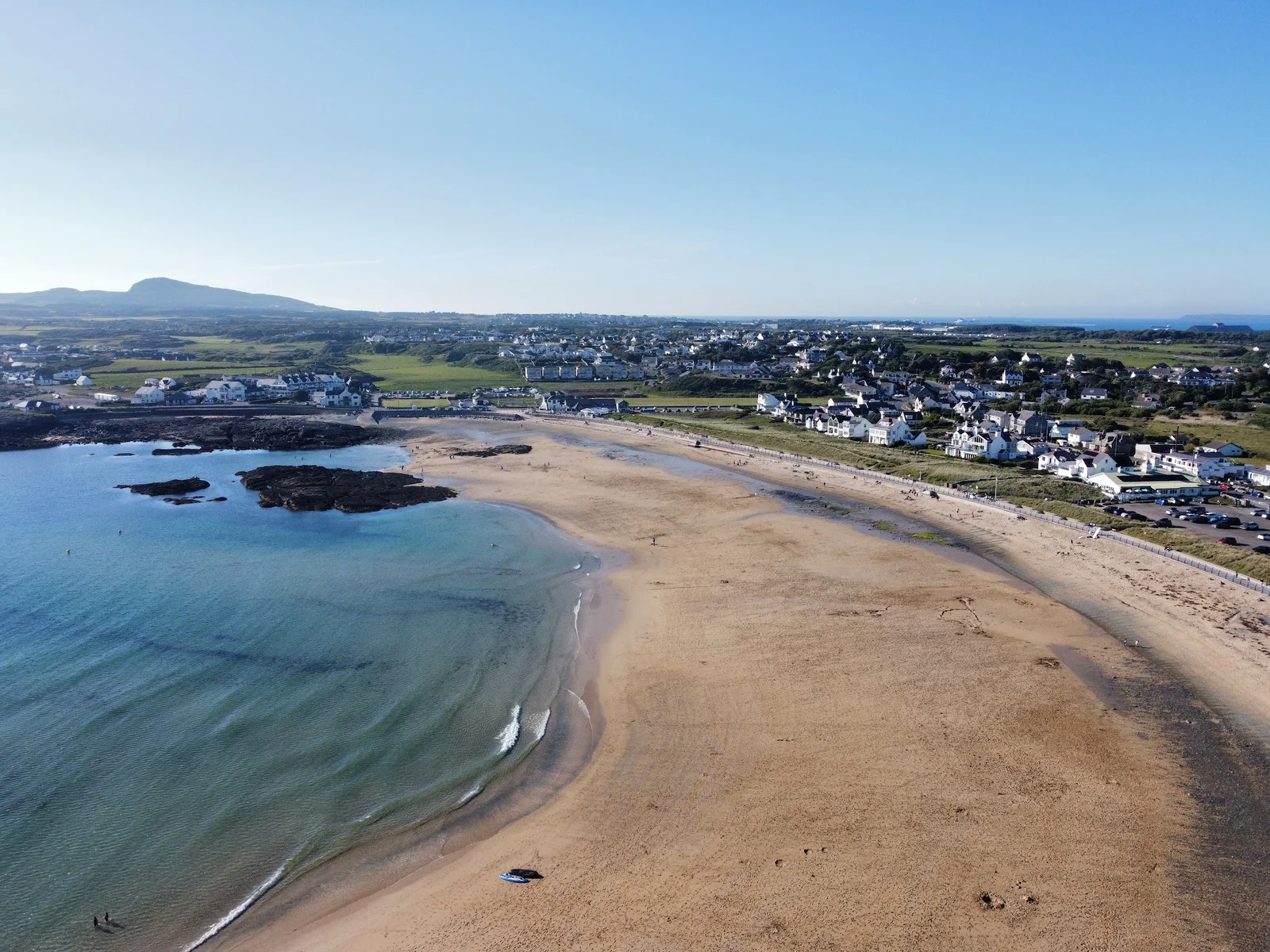 Sheltered turquoise waters of Trearddur Bay horseshoe cove on Holy Island, Anglesey